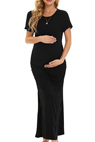 Woman wearing a black maternity maxi dress