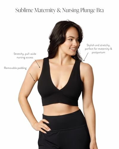 Woman wearing a black maternity and nursing plunge bra with removable padding.